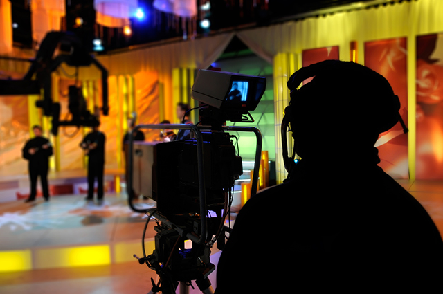 Cameraman records show in a TV Studio